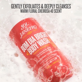 Sol de Janeiro Bom Dia Bright Body Wash in red bottle surrounded by foamy lather, Warm Floral Cheirosa 40 scent