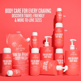 Sol De Janeiro Bom Dia Bright Body Wash collection displayed in multiple sizes on a coral background with campaign text overhead.