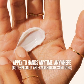 Sol De Janeiro Brazilian Touch Hand Cream swipe of white cream on palm, with text: Apply to hands anytime, anywhere