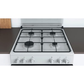 Indesit 60cm white freestanding gas double cooker, top view showing 4-burner hob with black cast iron pan supports and control knobs