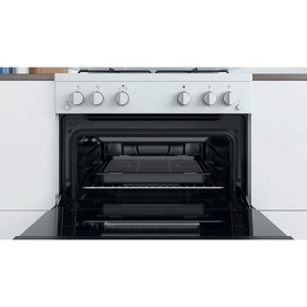Indesit white 60cm freestanding gas double cooker with open oven door revealing interior rack and grill, four gas hob burners on top
