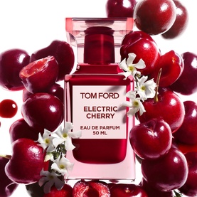 TOM FORD Electric Cherry Eau de Parfum 100ml in deep red bottle, styled with fresh cherries and white blossoms on white background