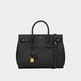Saint Laurent Sac de Jour Supple Small Leather Bag in black calf leather with gold-toned hardware, padlock detail, top handles and detachable strap