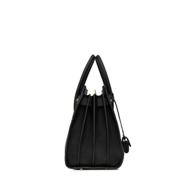 Saint Laurent Sac de Jour Supple Small Leather Bag in black calf leather, side profile, gold-tone hardware