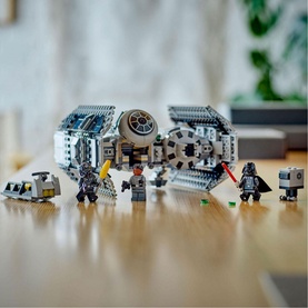 Lego Star Wars TIE Bomber set with 625 pieces, featuring the grey bomber model and five minifigures including Darth Vader