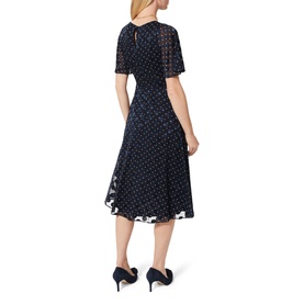 Model wearing Hobbs Ciera Spot Print Midi Dress in blue, showing keyhole back, short flutter sleeves, and flared skirt. Styled with navy heels