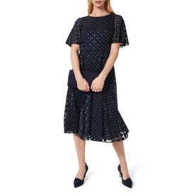 Model wearing Hobbs Ciera Spot Print Midi Dress in blue with flutter sleeves, round neckline, polka dot pattern and flared skirt