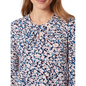 Model wearing Hobbs Julia Floral Print Top in pink with blue floral print, keyhole neckline detail and three-quarter sleeves