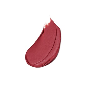 Est&eacute;e Lauder Pure Color Matte Lipstick swatch in Rule Maker, a deep berry-rose tone, showing creamy matte texture