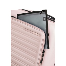 Samsonite STACKD Four-Wheel Expandable Spinner 55cm in pink, showing open top compartment with laptop sleeve and zip detail