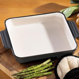 Hairy Bikers Enamelled Cast Iron 23cm Square Dish in grey with white enamel interior and dual handles, styled with asparagus