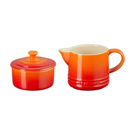 Le Creuset Stoneware Milk & Sugar Set in orange, ceramic creamer jug with handle and lidded sugar bowl