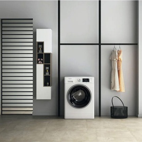 Whirlpool Black Line Freshcare 10Kg 1400 Spin washing machine in white, styled in a modern laundry room setting