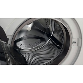 Whirlpool Black Line Freshcare 10Kg 1400 Spin washing machine in white, close-up of stainless steel drum interior with black trim detail