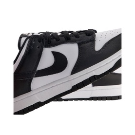 Nike Dunk Low-Top Trainers in white and black leather, featuring Swoosh logo, perforated toe box, and rubber track sole