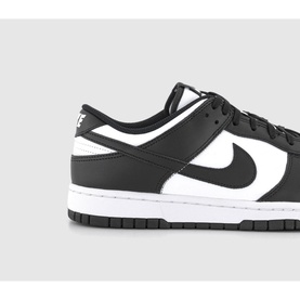 Nike Dunk Low-Top Trainers in white and black leather, featuring Swoosh logo, lace-up fastening, and rubber track sole