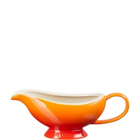 Le Creuset Stoneware Gravy Boat 460ml in orange, ombre finish from red base to cream rim, with loop handle and footed base