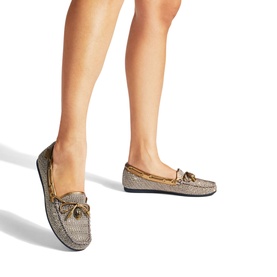 Model wearing Kurt Geiger London Eagle Houndstooth Moccasins in white with lace fastening, metallic trims, and logo details