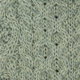 Irelands Eye Aran Chunky-Knit Scarf in green merino wool, close-up showing honeycomb, lattice and cable knit texture detail
