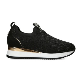 Kurt Geiger Lara Embellished Slip-On Trainers in black with all-over crystal embellishment, gold heel detail, and white flatform sole