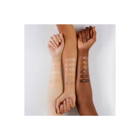 HOURGLASS Veil Hydrating Skin Tint foundation shades swatched across three arms in fair, medium, and deep skin tones