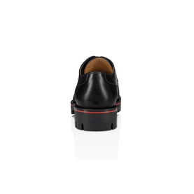 Christian Louboutin Davisol Oxford Leather Shoes in black, rear view showing chunky lug sole with iconic red trim detail