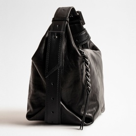 Zadig Le Cecilia Shoulder Bag in black leather, side view showing curb chain detail, contrast stitching, and black metal buckle strap
