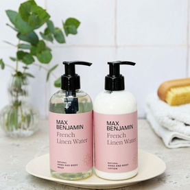 Max Benjamin French Linen Water Natural Hand Lotion 300ml in white pump bottle, styled with matching hand wash on ceramic tray