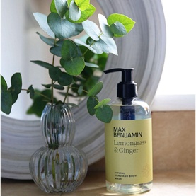 Max Benjamin Natural Hand Wash Lemongrass & Ginger 300ml in clear pump bottle with yellow label, styled with eucalyptus in ribbed vase