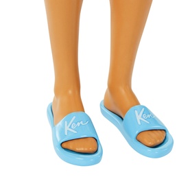 Barbie Blonde Ken Doll's feet wearing light blue branded Ken slide sandals with white logo detail
