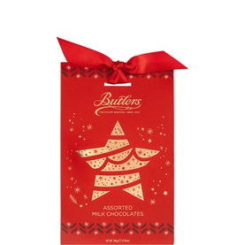 Butlers Assorted Milk Chocolate Luxury Pouch in red festive gift box with Christmas tree design and red satin bow