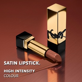 YSL Rouge Pur Couture Lipstick in a nude-brown shade, gold casing with YSL logo, bullet extended beside cap on terracotta background.