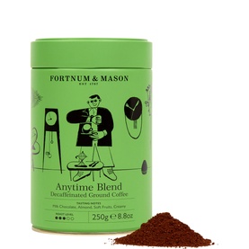 Fortnum & Mason Anytime Blend Decaffeinated Ground Coffee Tin 250g in green with illustrated figure, shown with loose ground coffee