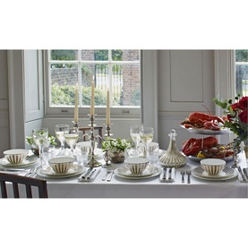 Jasper Conran Platinum Coffee Cup & Saucer styled on a dressed dining table with gold candlesticks, glassware, and festive lobster centrepiece