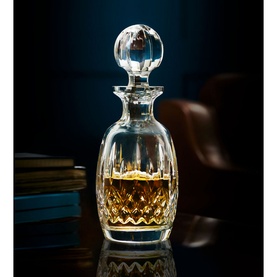 Waterford Lismore Decanter Round 500ml in clear crystal with diamond-cut detailing, spherical stopper, filled with amber liquid on reflective surface
