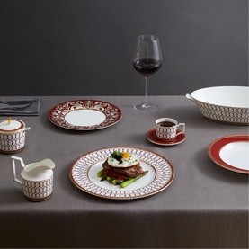 Wedgwood Renaissance Red Oval Serving Bowl 33.9cm in bone china with red and gold geometric pattern, styled on a dining table with matching dinnerware