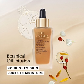 Est&eacute;e Lauder Futurist SkinTint Serum Foundation SPF 20 30ml bottle with dropper cap, styled with botanical ingredients on warm beige background
