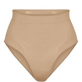 Skims Mid Waist Brief in Clay, beige smooth shapewear with high-cut leg and elasticated waistband