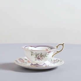 Wedgwood Fortune Teacup and Saucer 150ml in white with multicolour floral print, scalloped rim and gold handle detail