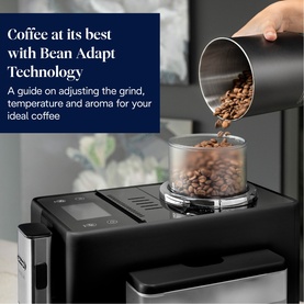 Delonghi Rivelia Automatic Compact Bean To Cup Coffee Machine in black, with coffee beans being poured into the bean hopper