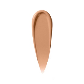 Bobbi Brown Skin Corrector Stick concealer swatch in Dark Bisque, a warm medium-tan tone, shown as a teardrop smear on white background