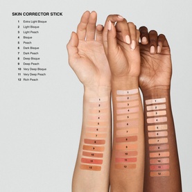 Bobbi Brown Skin Corrector Stick shade swatches in 13 shades shown across three arms with light to deep skin tones, including Very Deep Bisque