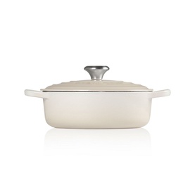 Le Creuset Signature Cast Iron Sauteuse 24cm in white with silver knob handle and loop handles, viewed from slight angle