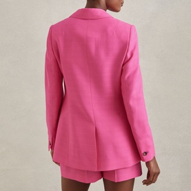 Model wearing Reiss Hewey Single-Breasted Blazer in pink, rear view, styled with matching pink shorts