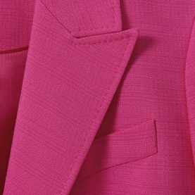 Reiss Hewey Single-Breasted Blazer in pink, close-up of textured fabric, peak lapel, and flap pocket detail