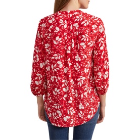 Model wearing Hobbs Essie Floral Blouse in red, white floral print, three-quarter sleeves, half button placket, paired with blue jeans