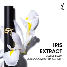 YSL Lash Clash Waterproof Mascara in black tube displayed with white iris flowers, highlighting iris extract ingredient