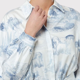 Model wearing Helen McAlinden Odette Toile de Jouy Shirt Dress in blue, showing collar, long sleeves and floral scenic print detail