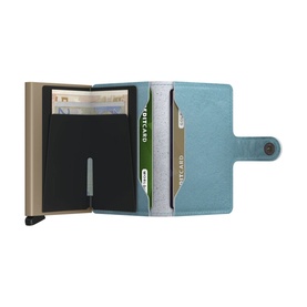 Secrid Floral Mini Wallet in blue leather, open showing aluminium Cardprotector with slide-out card mechanism and cash compartment