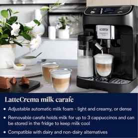 Delonghi Magnifica Plus Bean to Cup Coffee Machine in black with LatteCrema milk carafe, preparing frothy cappuccinos on a kitchen counter